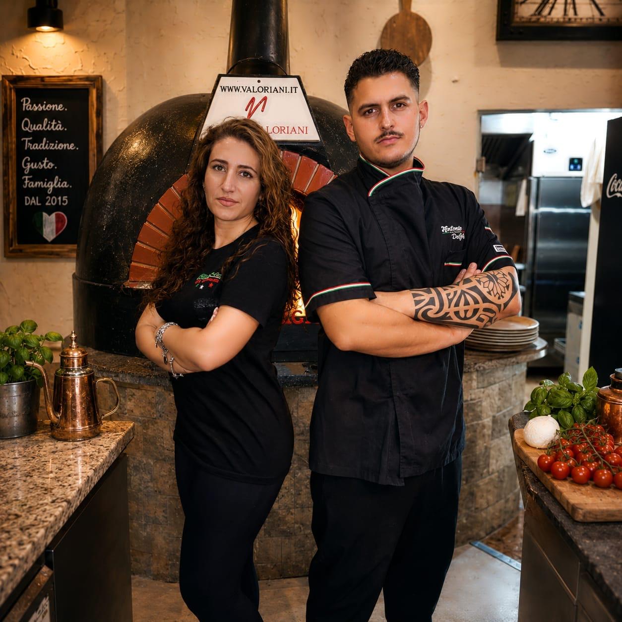 Das Team von Pizzeria Di Grazia vor dem Holzofen